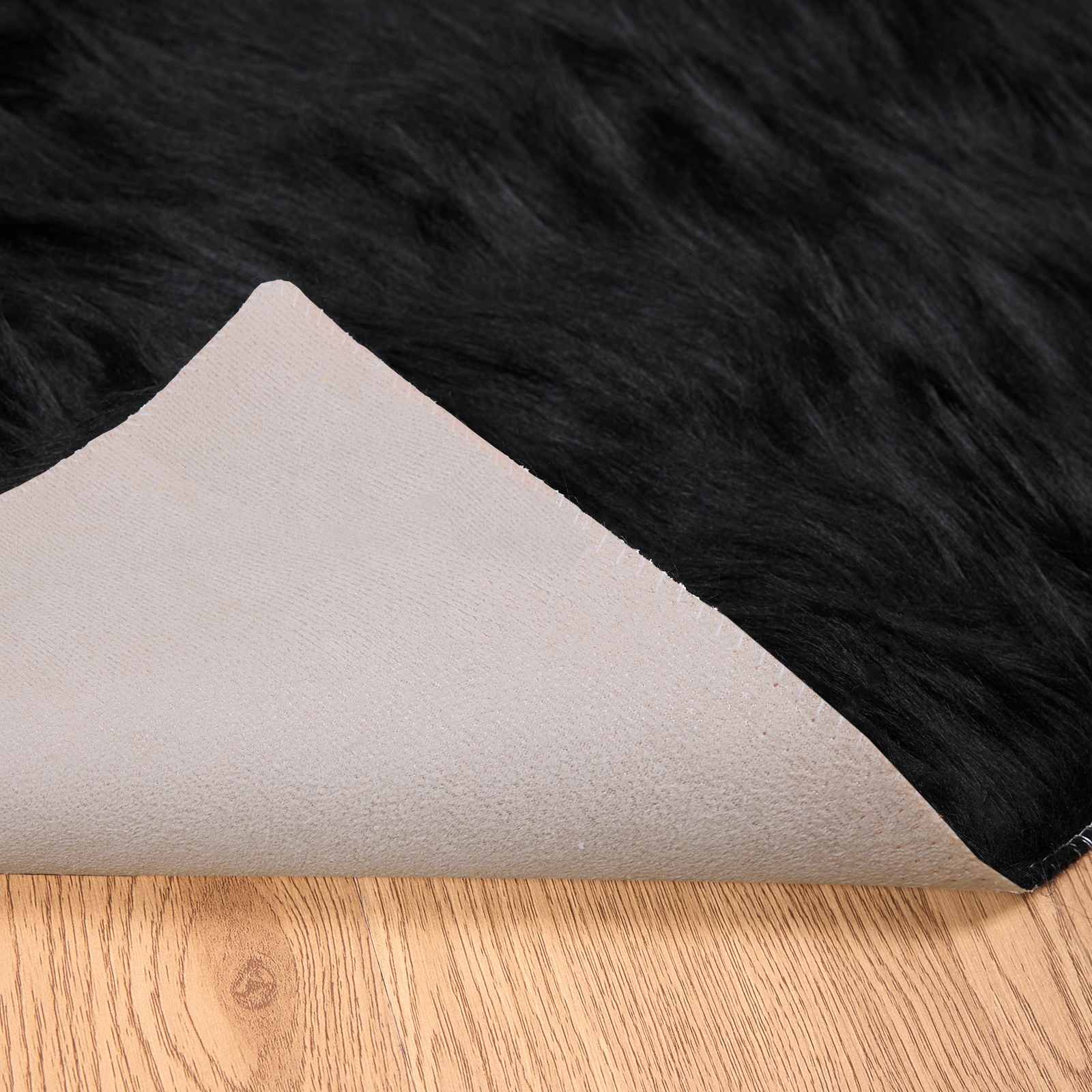 Dirbtinio avikailio kilimas Tafalla Juoda 60 x 110 cm